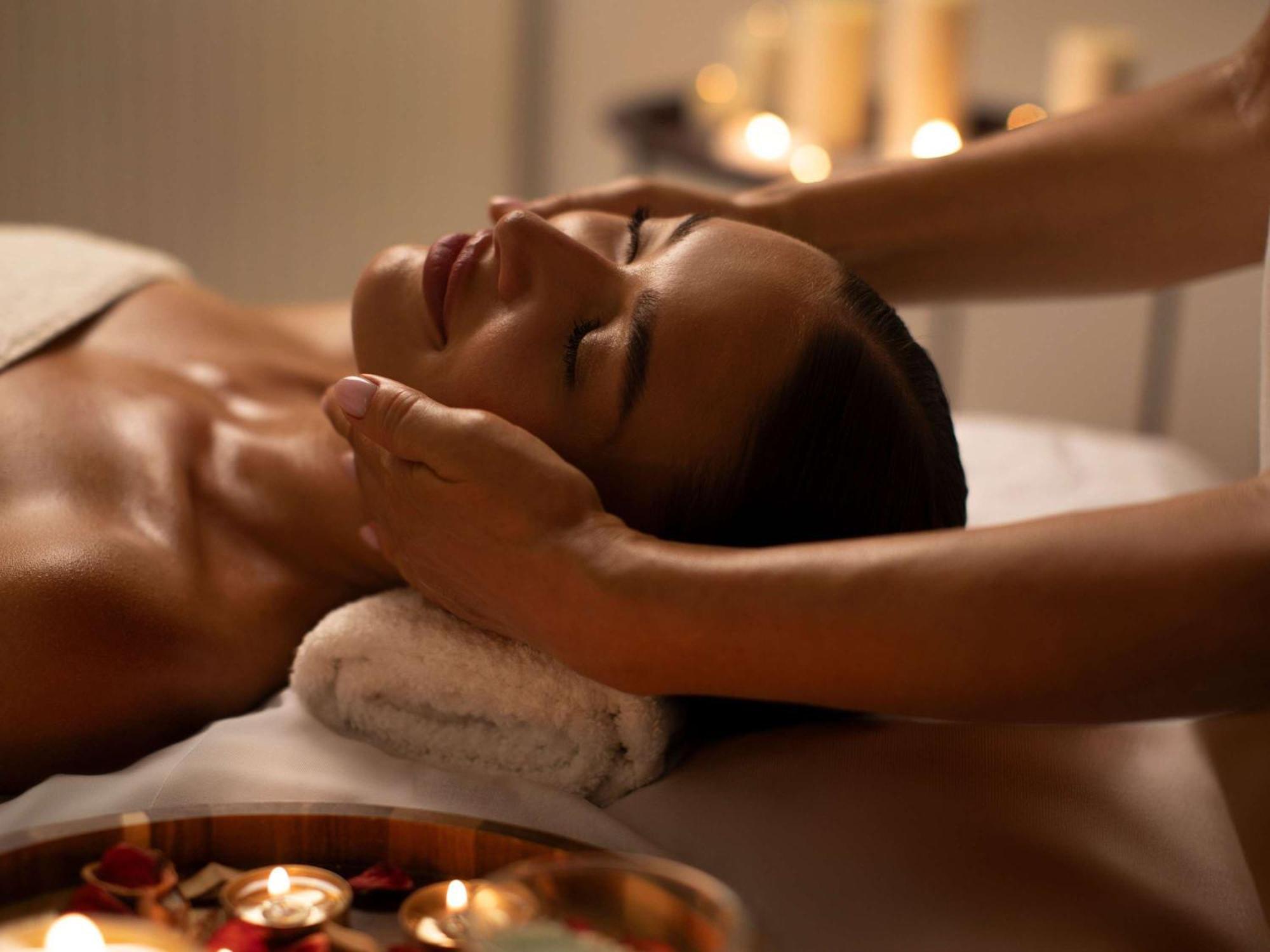 Moevenpick Hotel & Apartments Ghala Маскат Екстериор снимка A woman receiving a facial massage