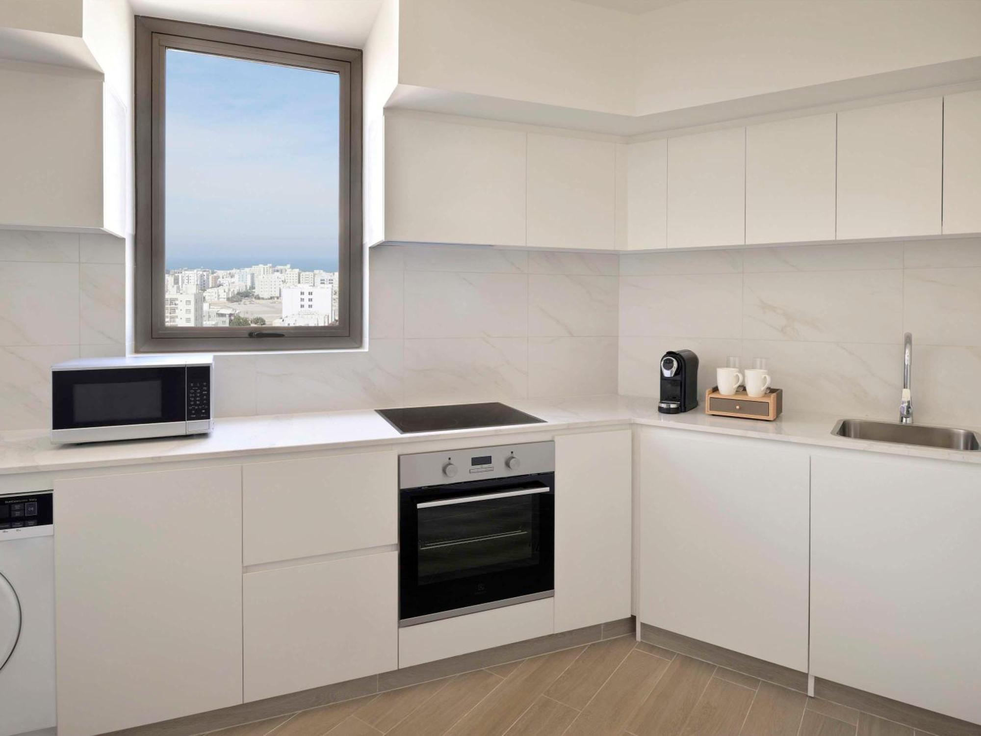 Moevenpick Hotel & Apartments Ghala Маскат Екстериор снимка A typical kitchen in a student apartment