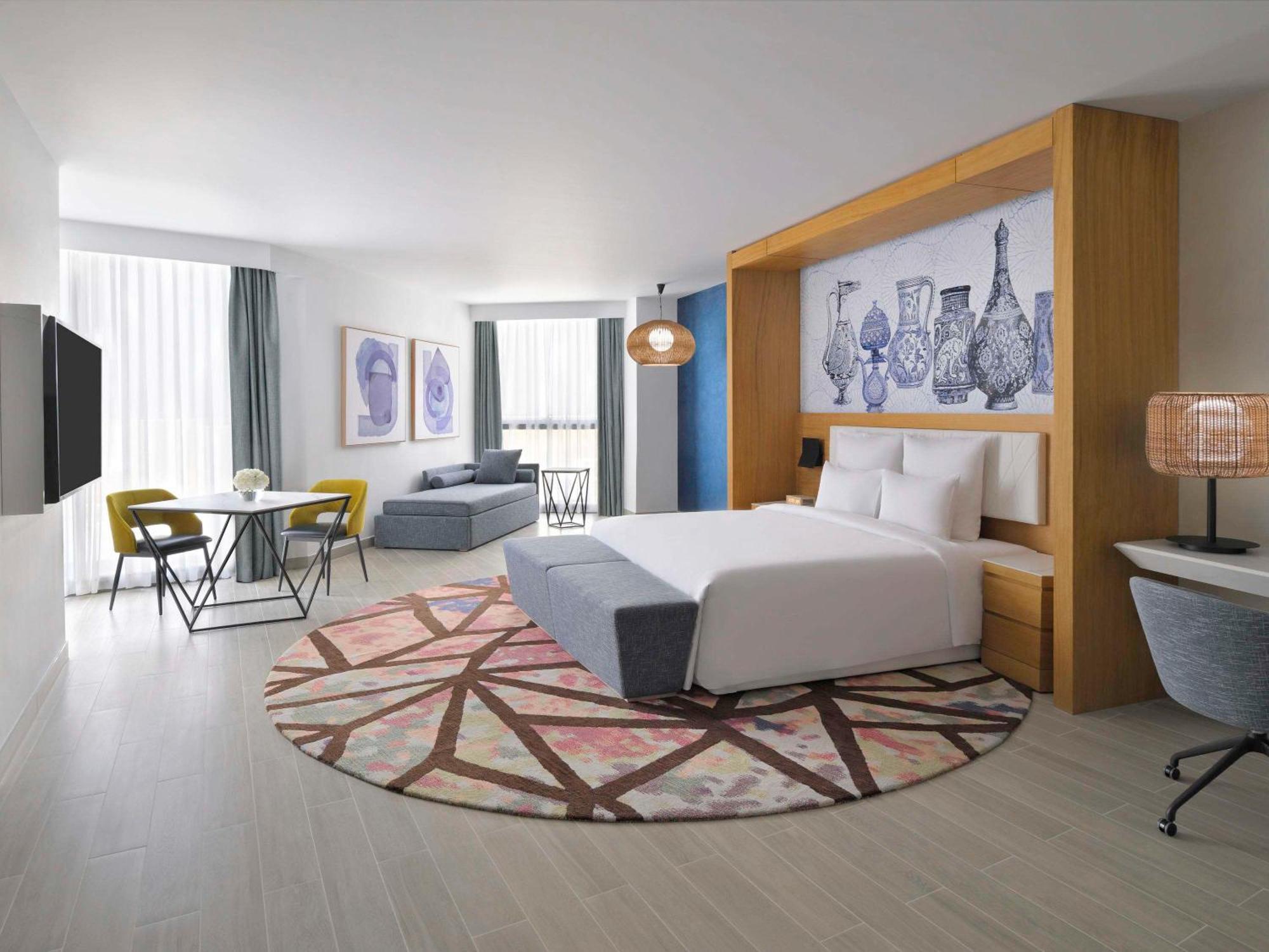 Moevenpick Hotel & Apartments Ghala Маскат Екстериор снимка A room at the hotel